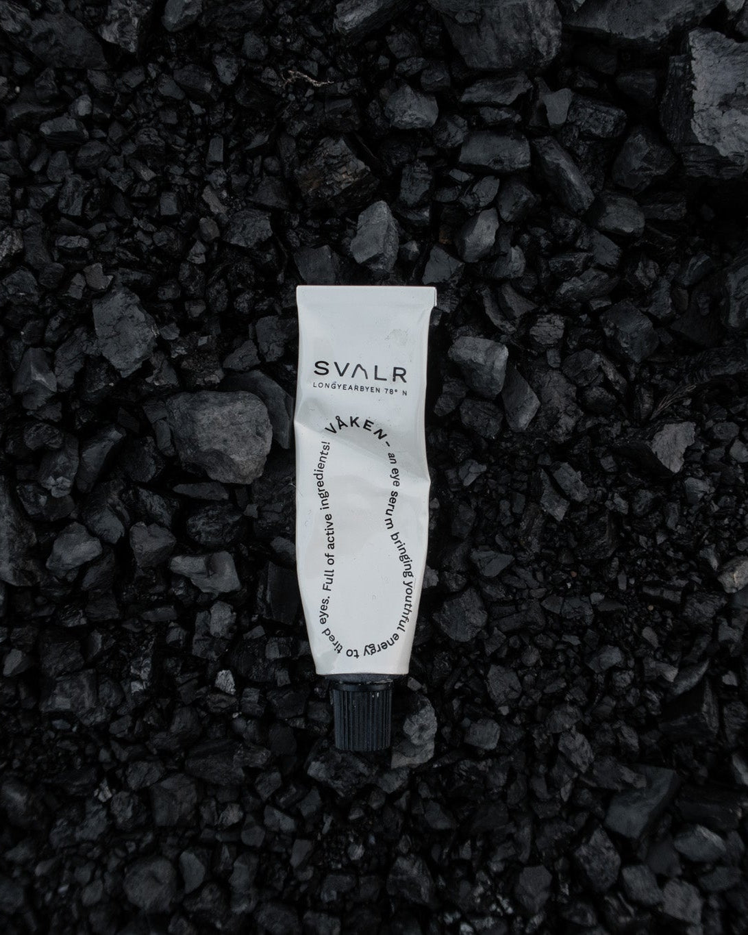 SVALR product on a bed of black stones